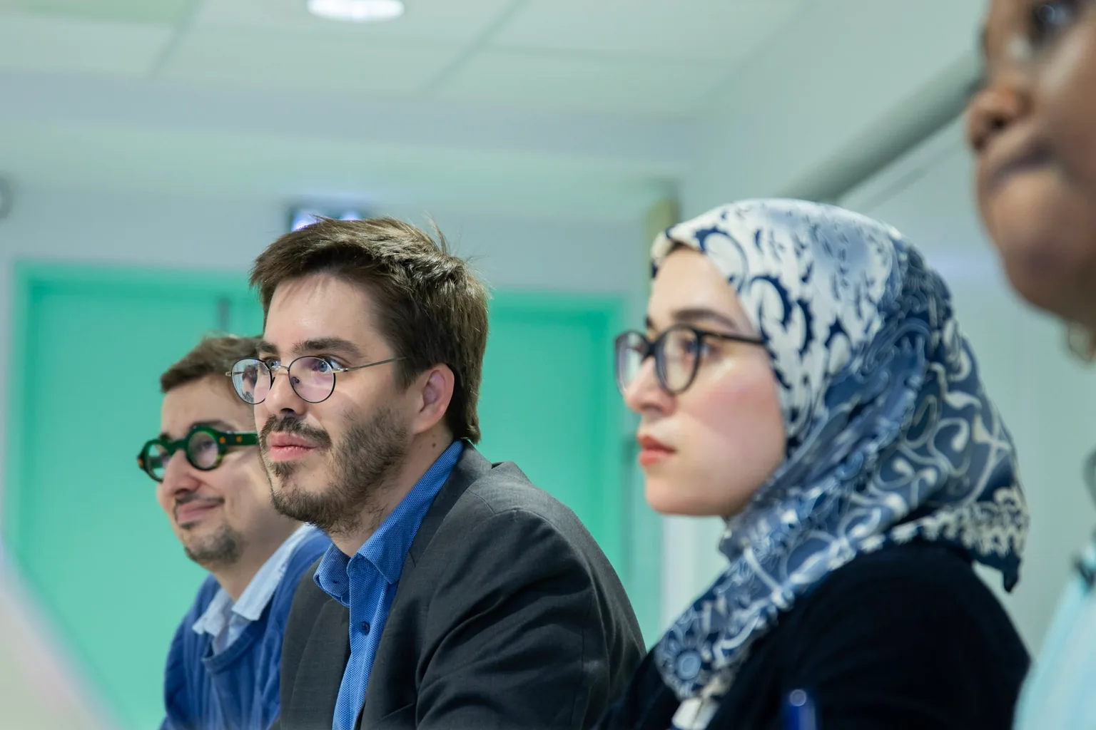 Participants de Toulouse Way attentifs pendant une rencontre associative à Toulouse